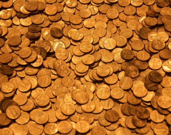 brown round coins on brown wooden surface